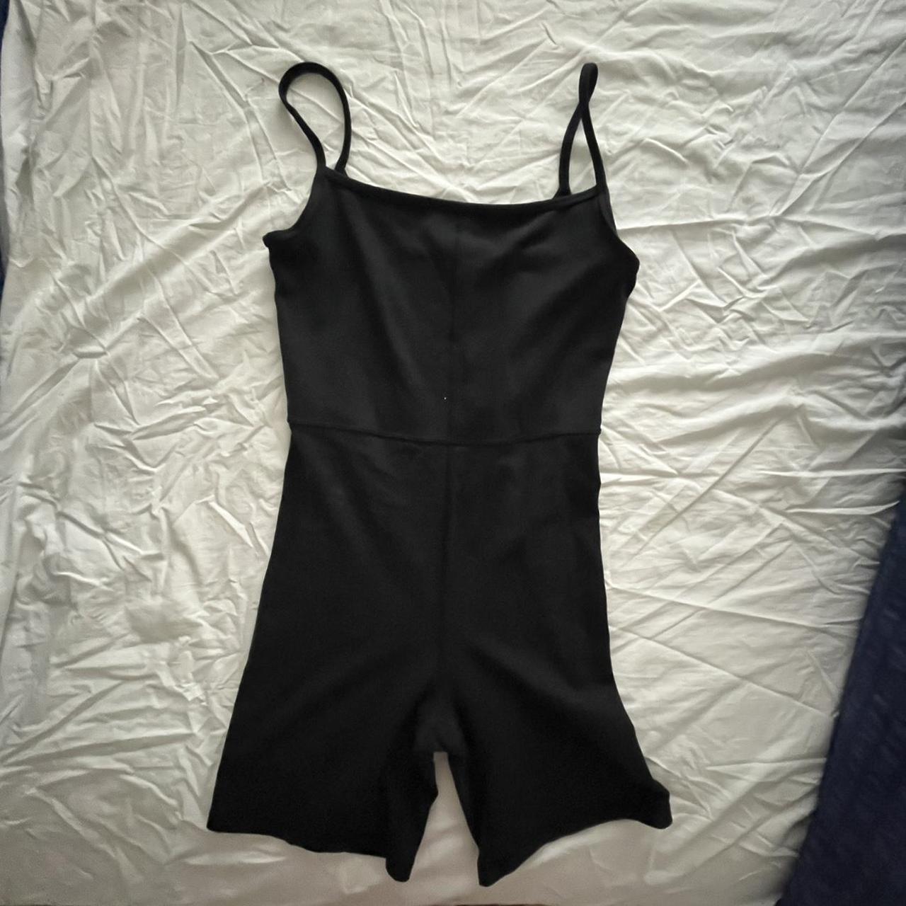 Black Babaton by Aritzia 7” divinity romper in a... - Depop