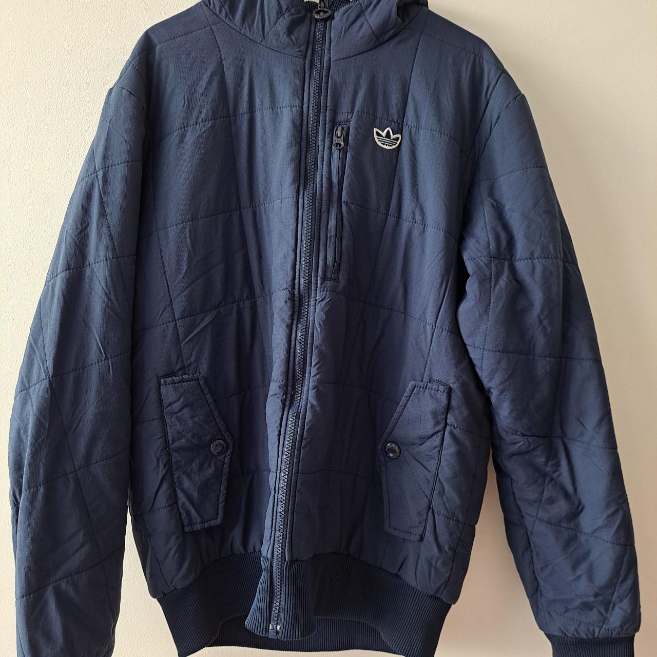 Vintage Navy Adidas Has a medium thick