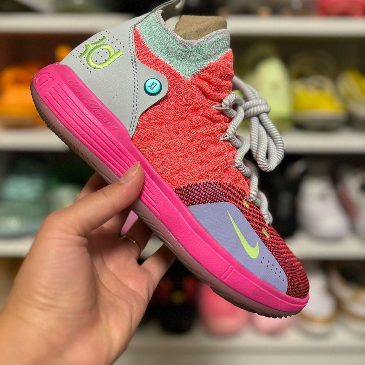 Pink kd 11 shoes hotsell