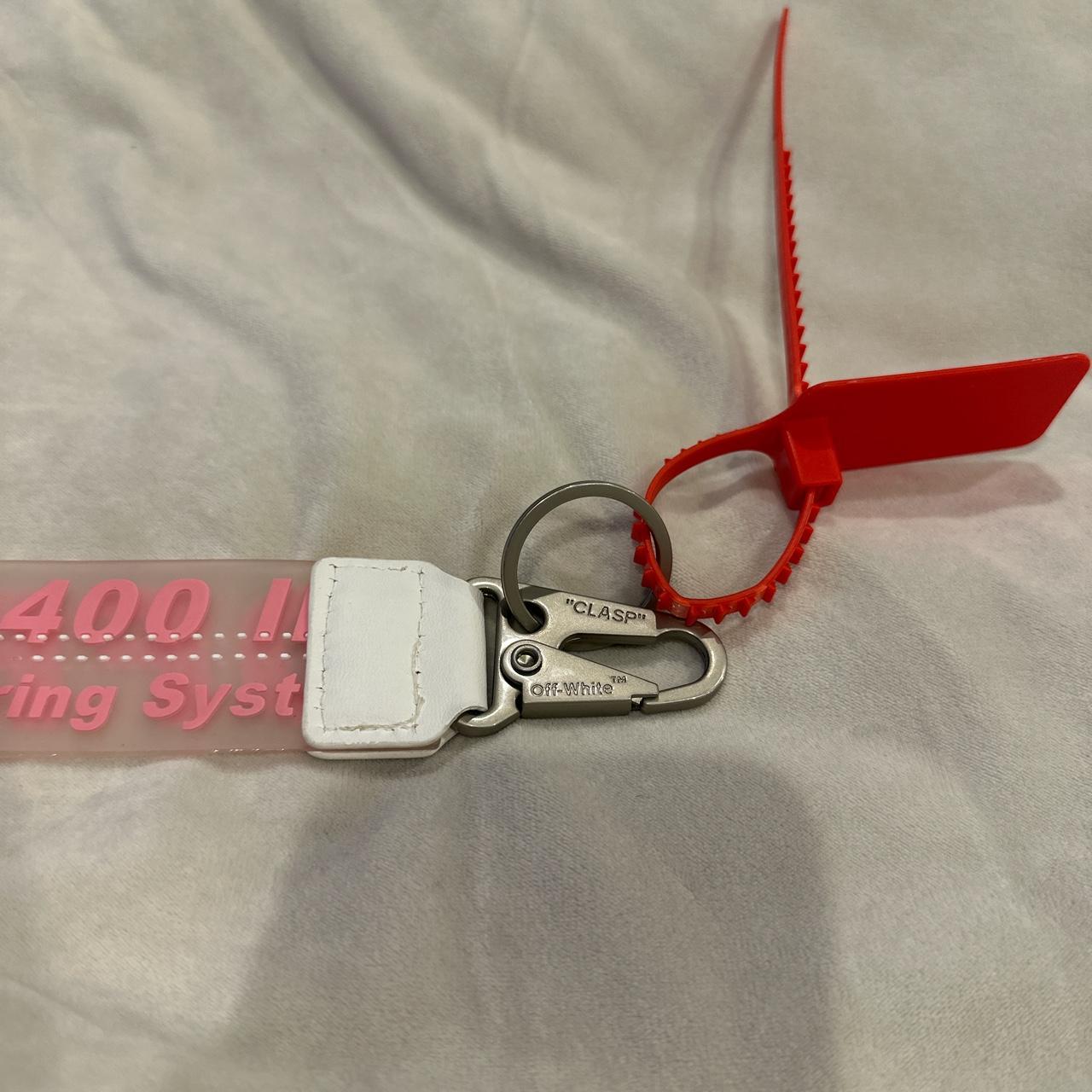 pink off white keychain with zip tie streetwear... Depop