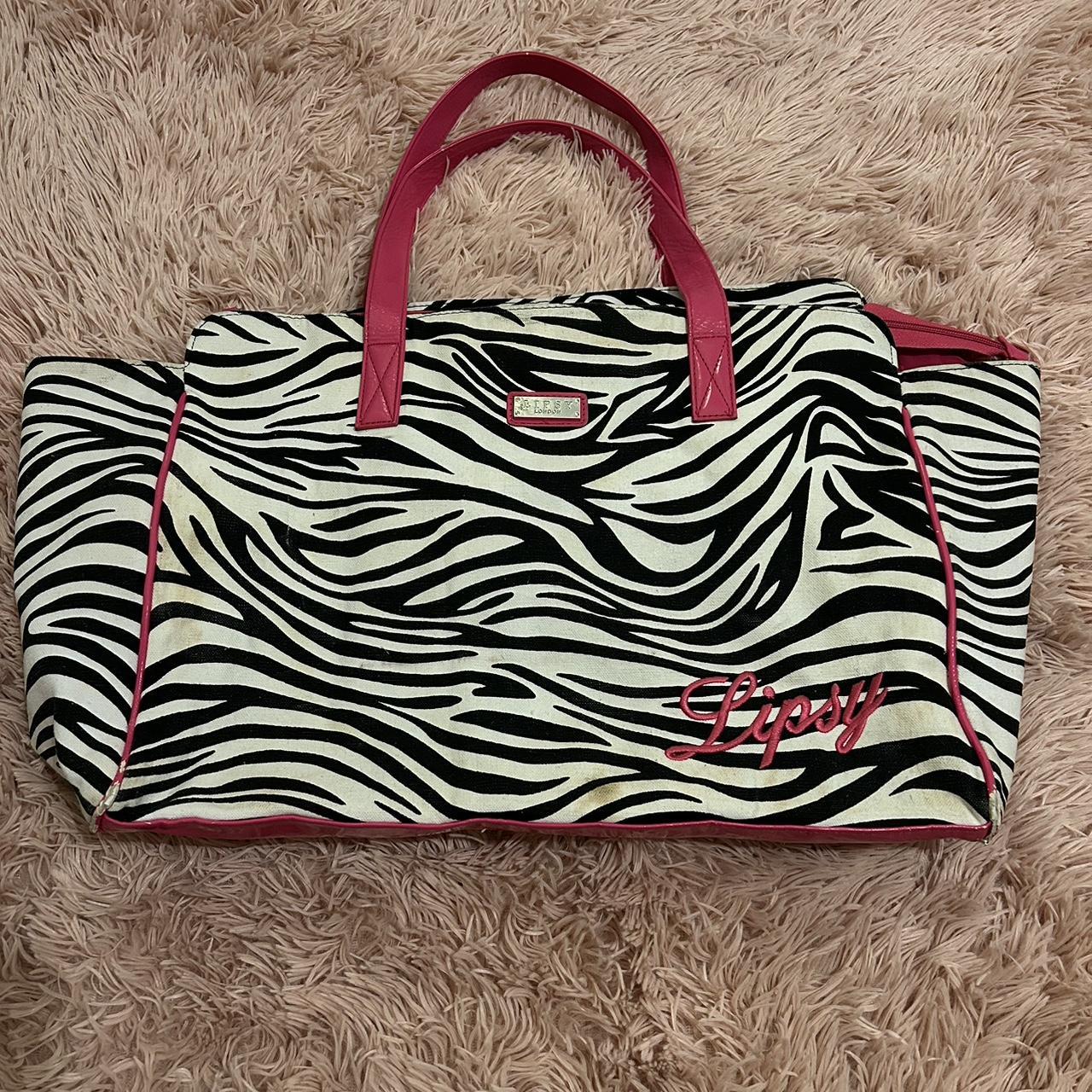 Y2K RARE LIPSY ZEBRA PRINT TRAVEL BAG brand is... Depop