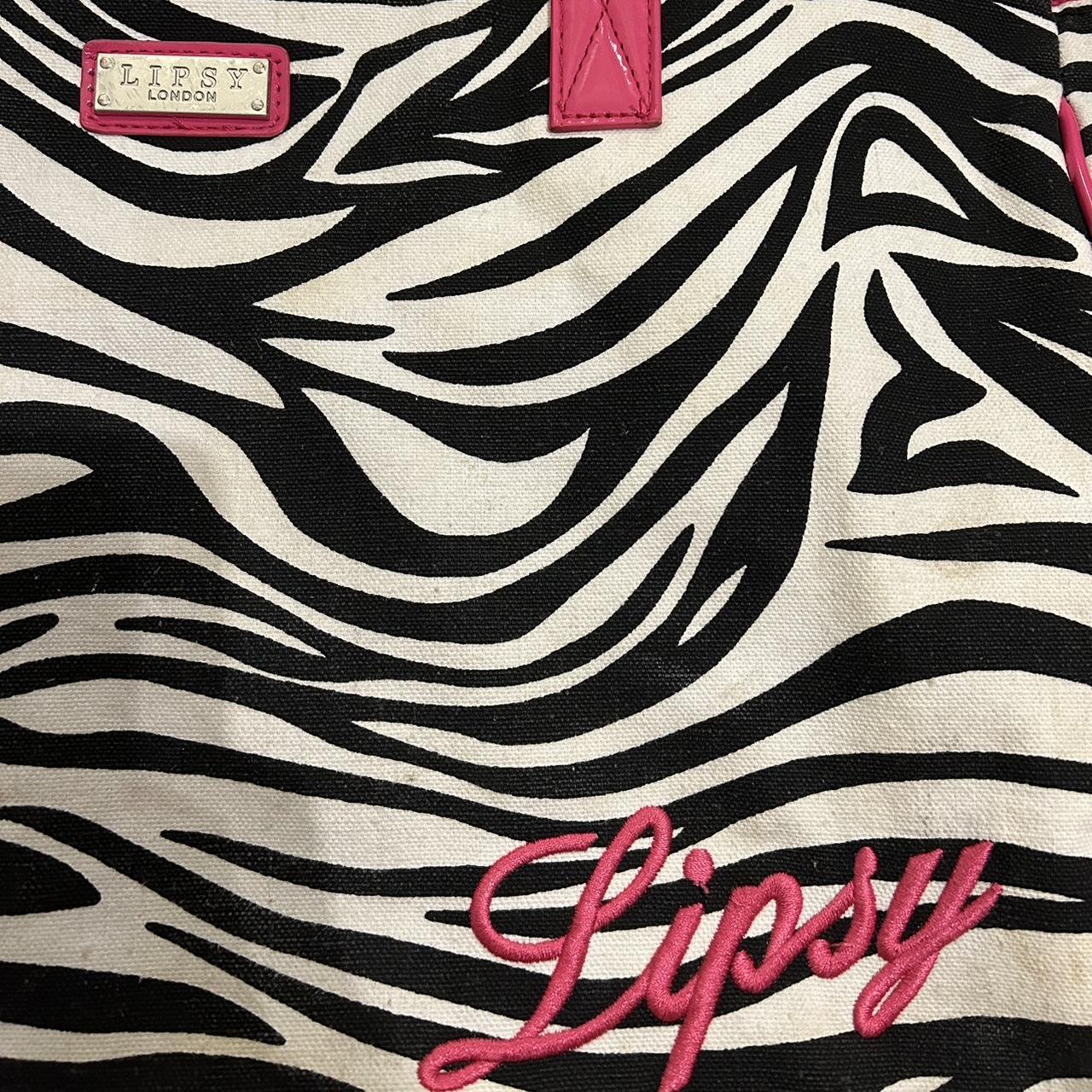 Y2K RARE LIPSY ZEBRA PRINT TRAVEL BAG brand is... Depop