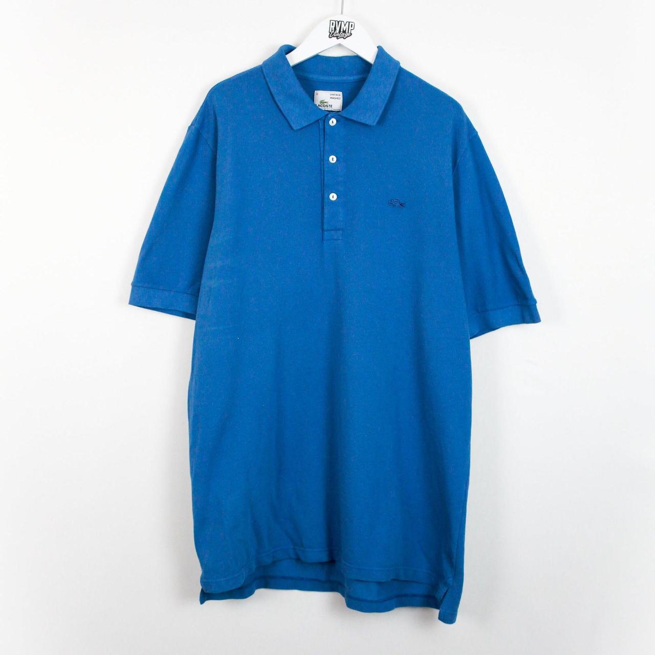 Lacoste 'Vintage Washed' Blue Polo Shirt... - Depop