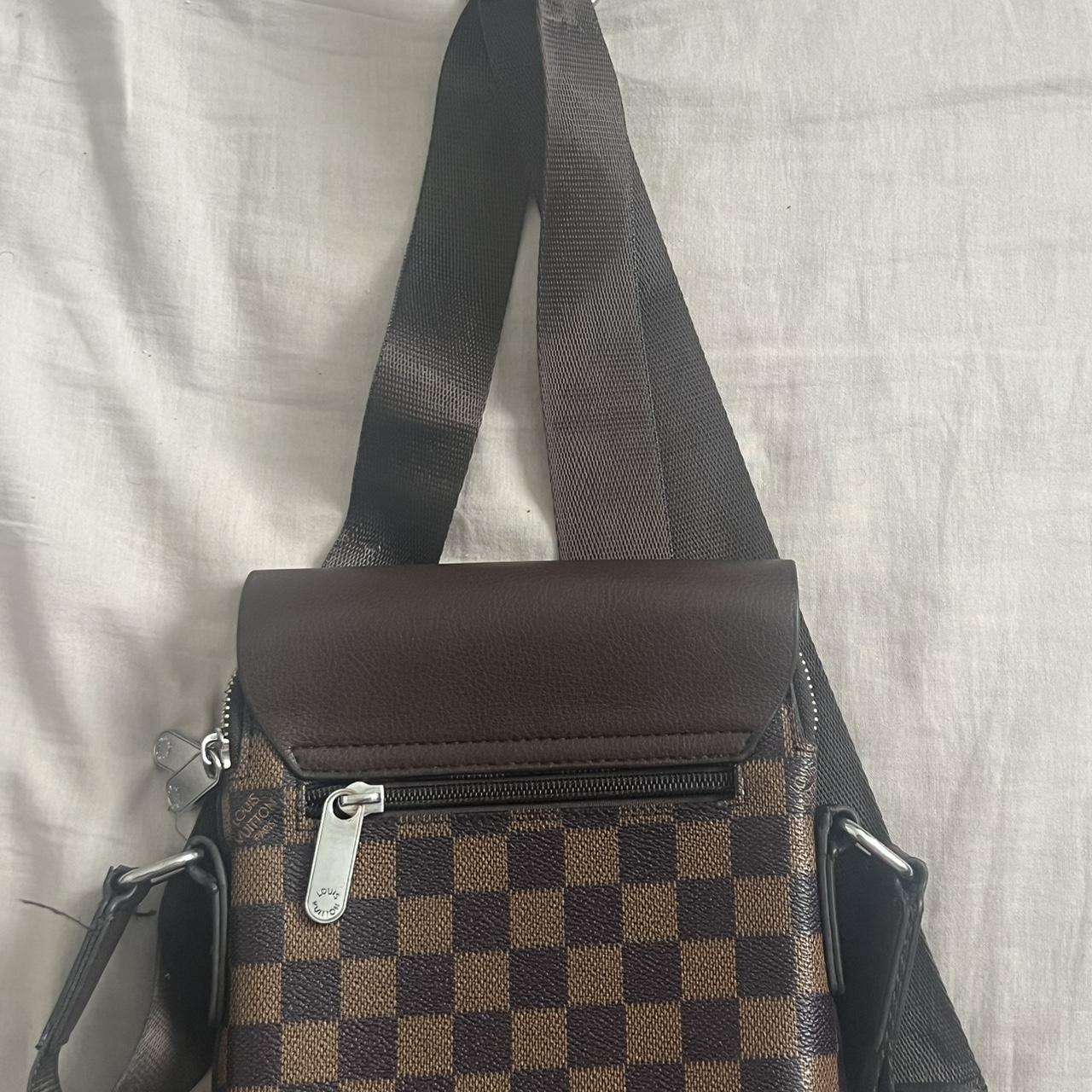 Used Louis Vuitton cross body bag. Some tearing and - Depop