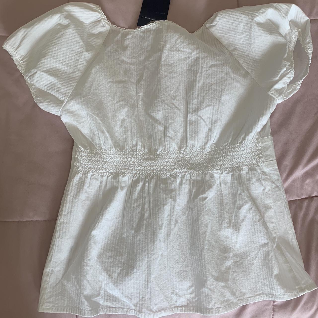 brandy melville blair cotton ruffle top nothing... - Depop