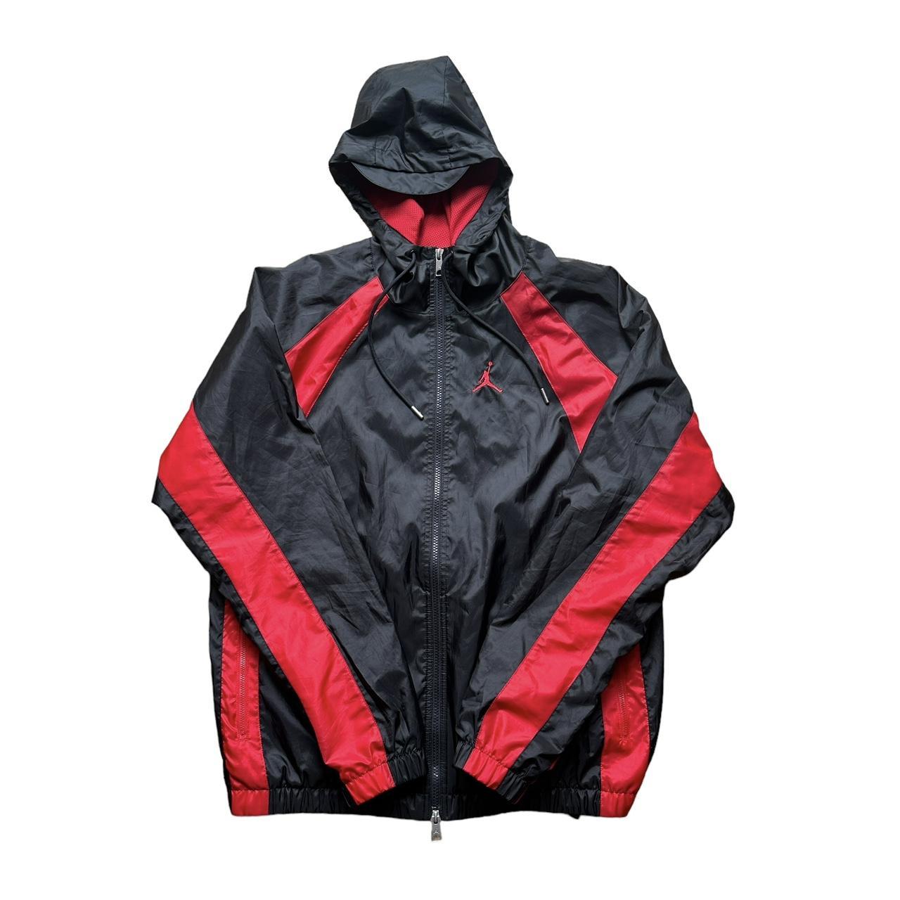 Black jordan windbreaker jacket hotsell