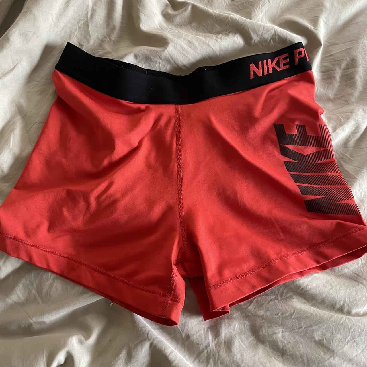 black and red nike pros marked size L but they def... - Depop