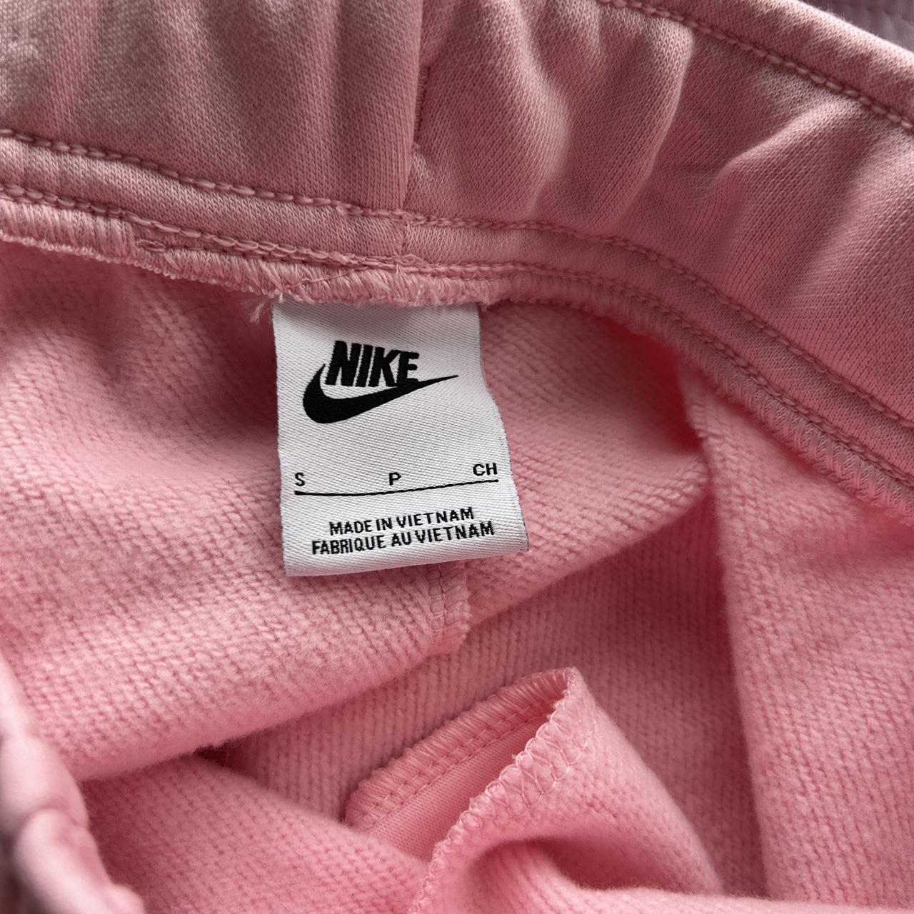 BRAND NEW pink nike sweatpants/joggers. the design... - Depop