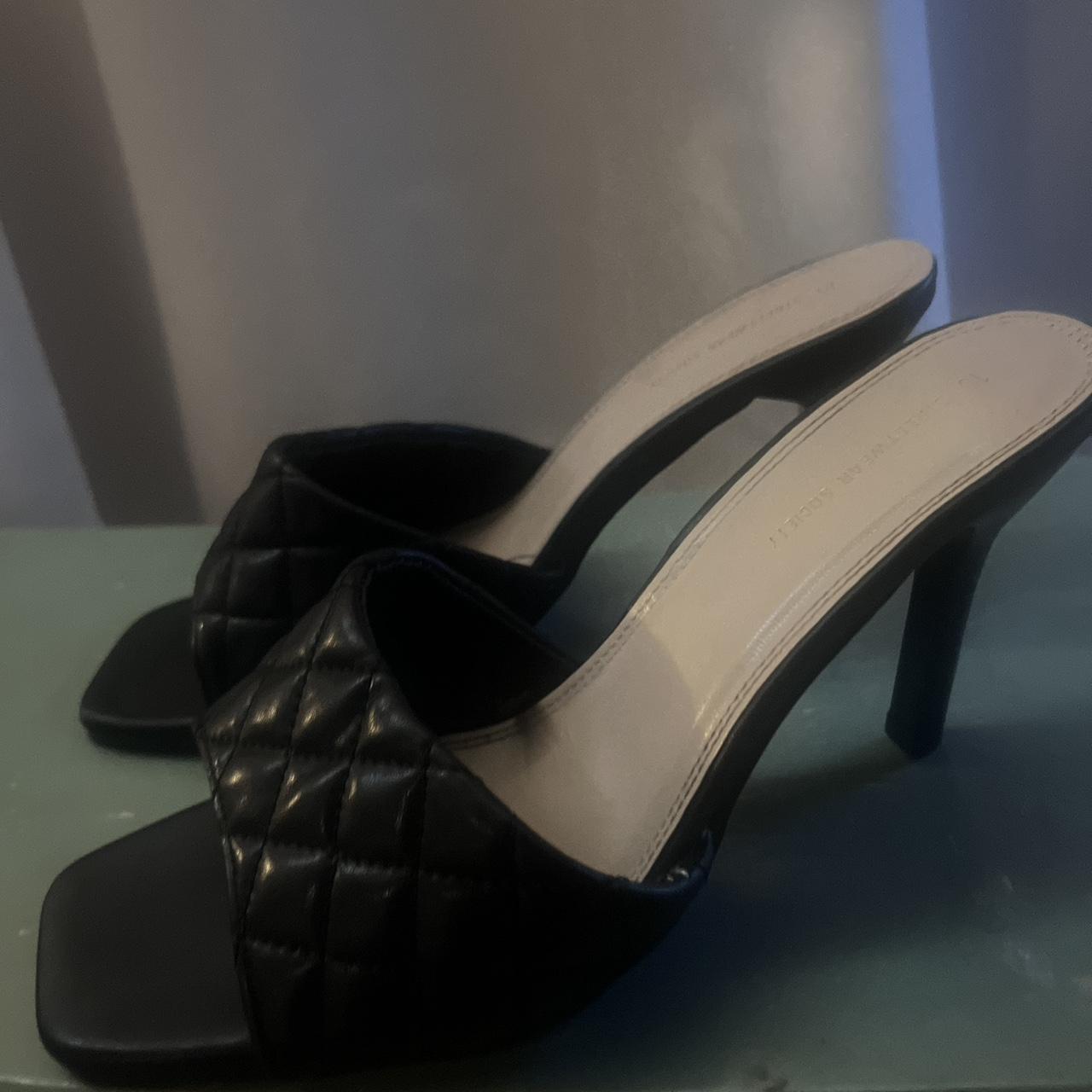 black leather kitten heels