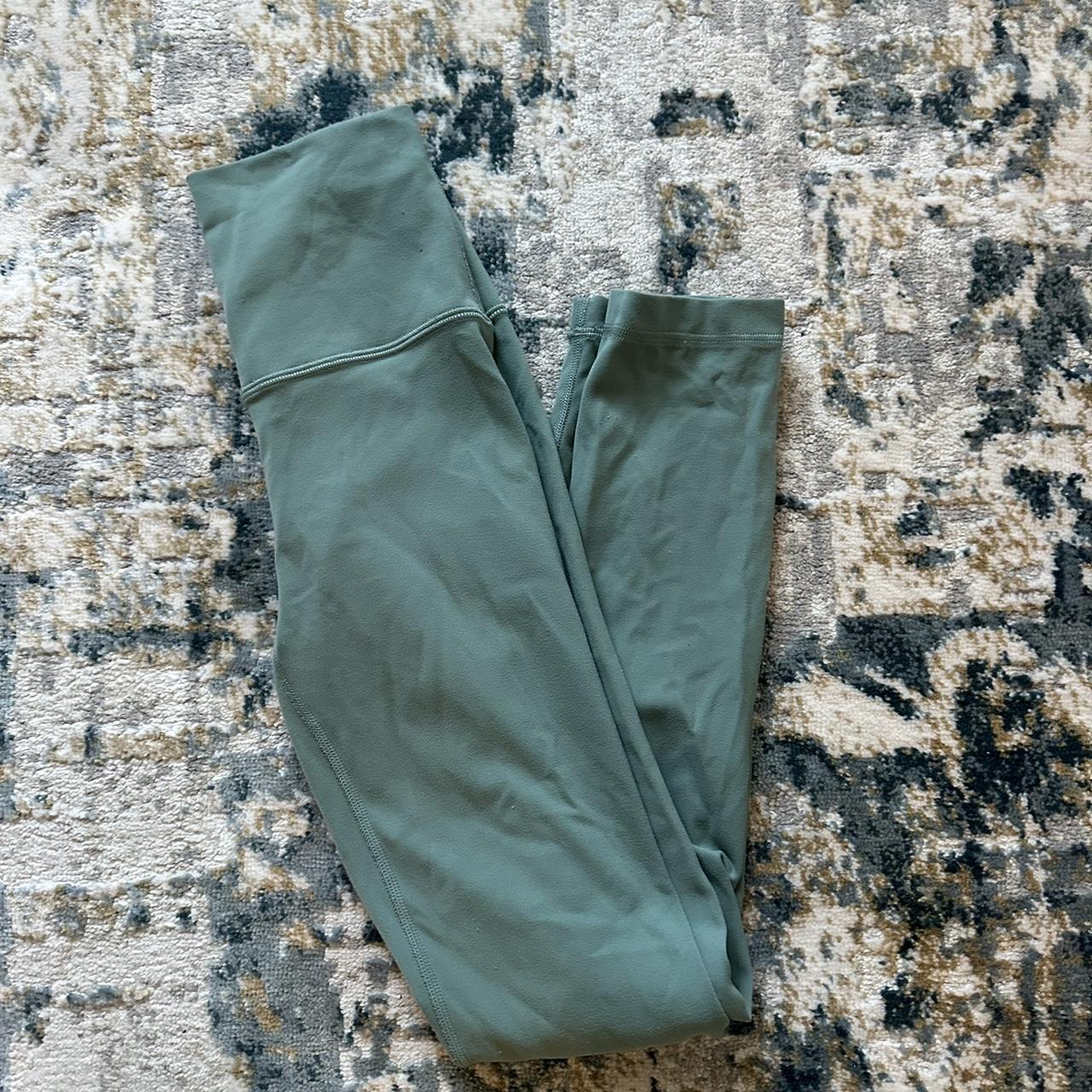 Lululemon green leggings. In new condition, size 2. - Depop