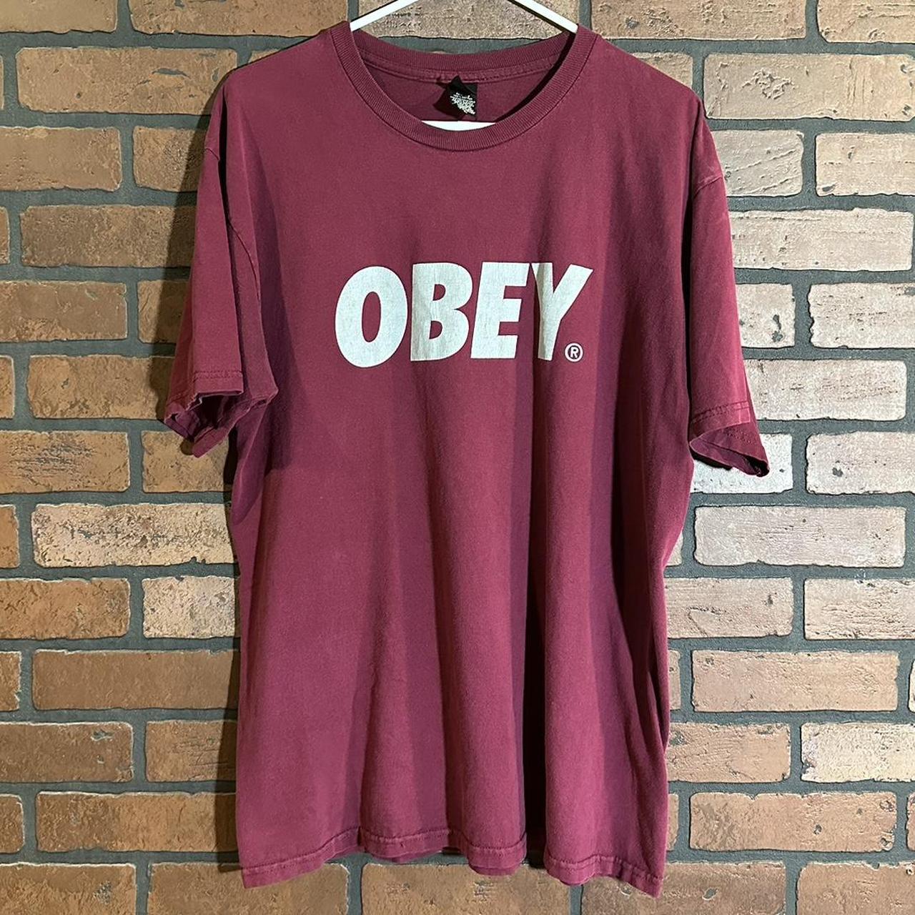 Maroon Obey Tee Tag (L) Normal wear and tiny pinhole... - Depop