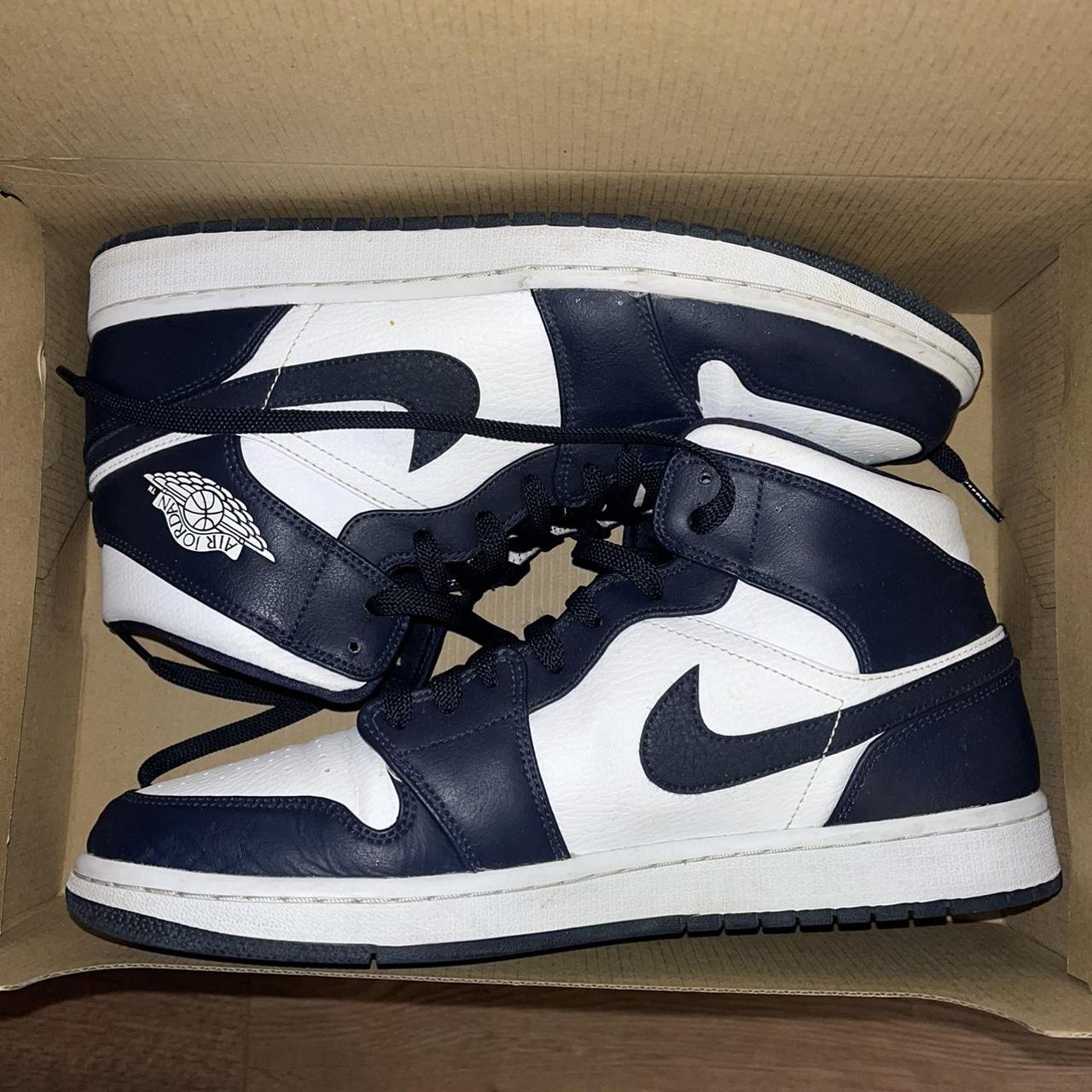navy blue and white jordans 1