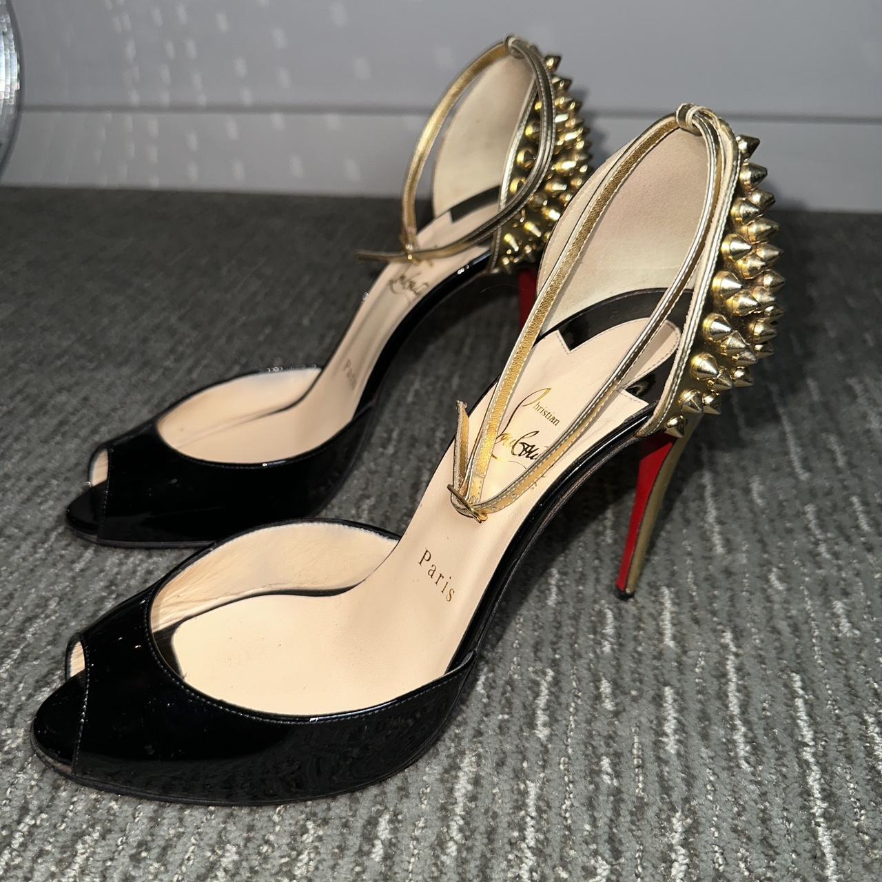 Authentic Christian Louboutin black and gold spiked. Depop