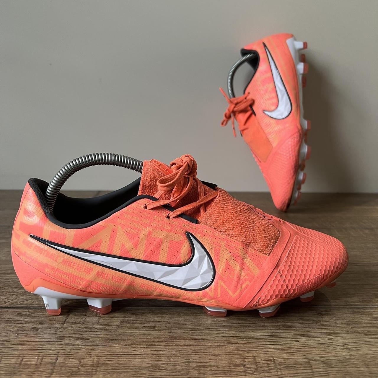 fluorescent orange nike shoes