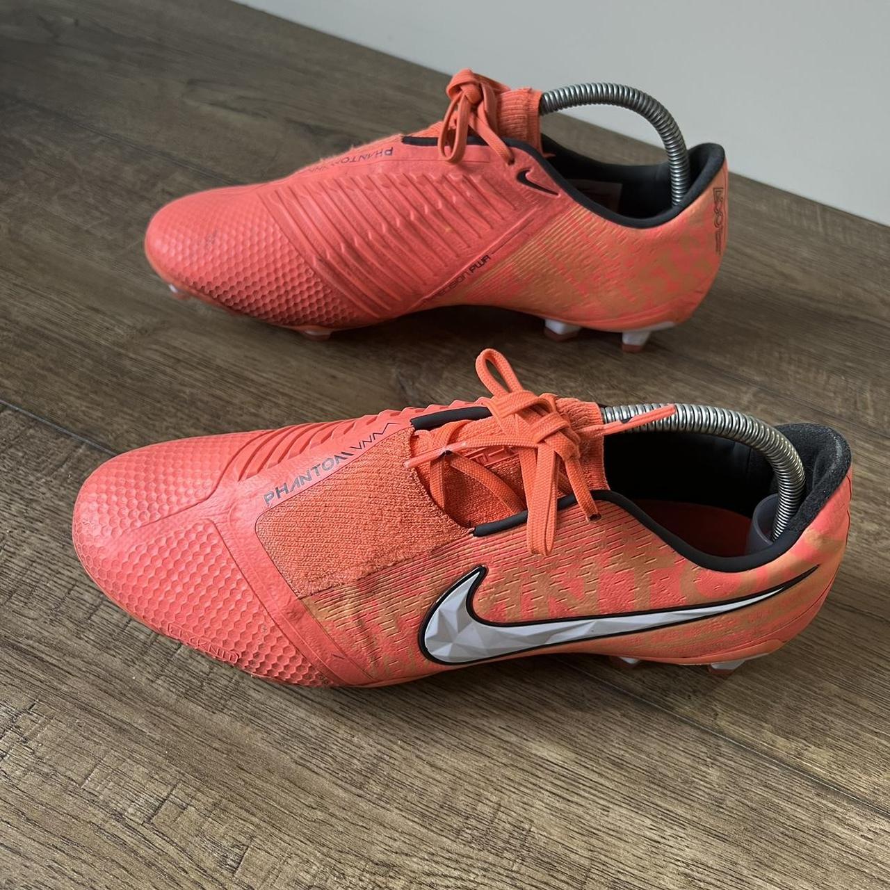 fluorescent orange nike shoes