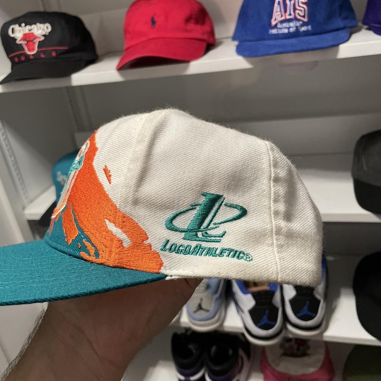 Vintage Logo 7 Miami Dolphins sweatshirt in white. - Depop