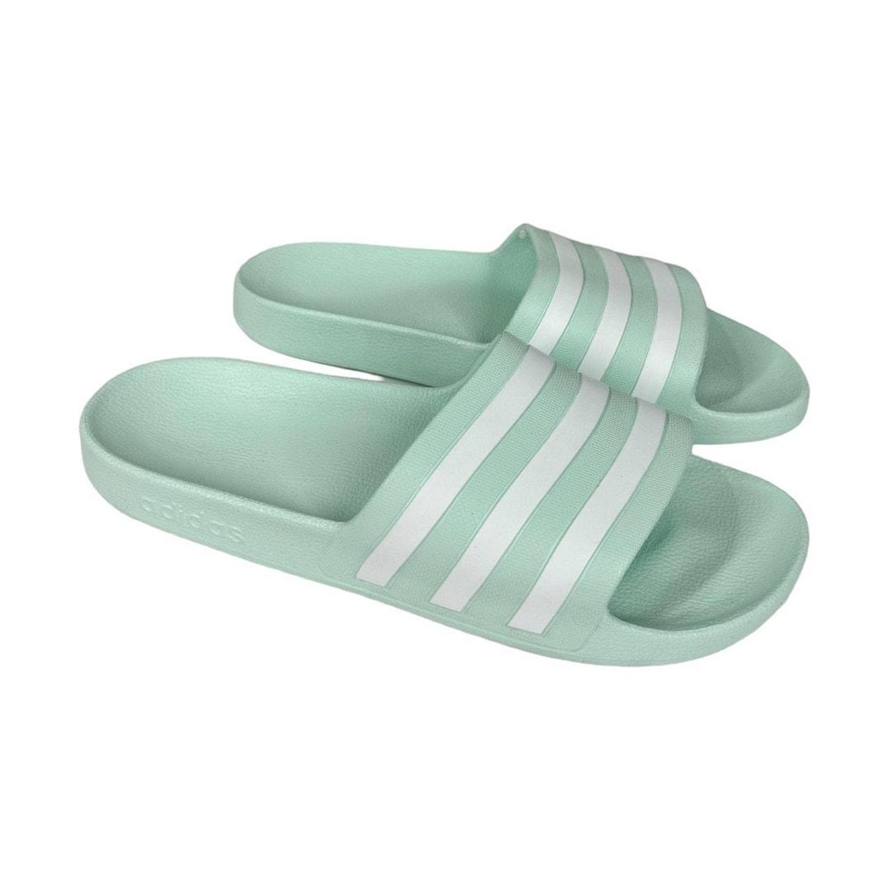 Adidas Women s Adilette Aqua Slides Sandals in Mint. Depop