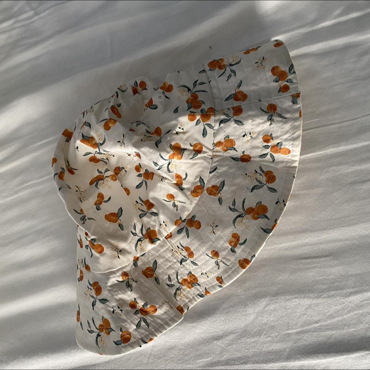 Abercrombie bucket hat with peach motif. Worn a few… - Depop