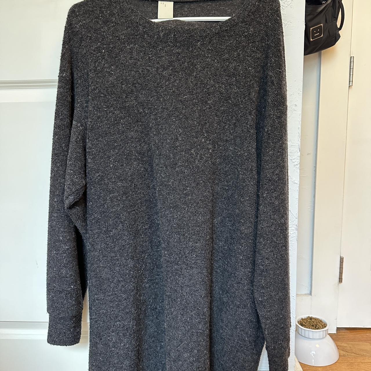 N. Hoolywood knit sweater that is knee length,...