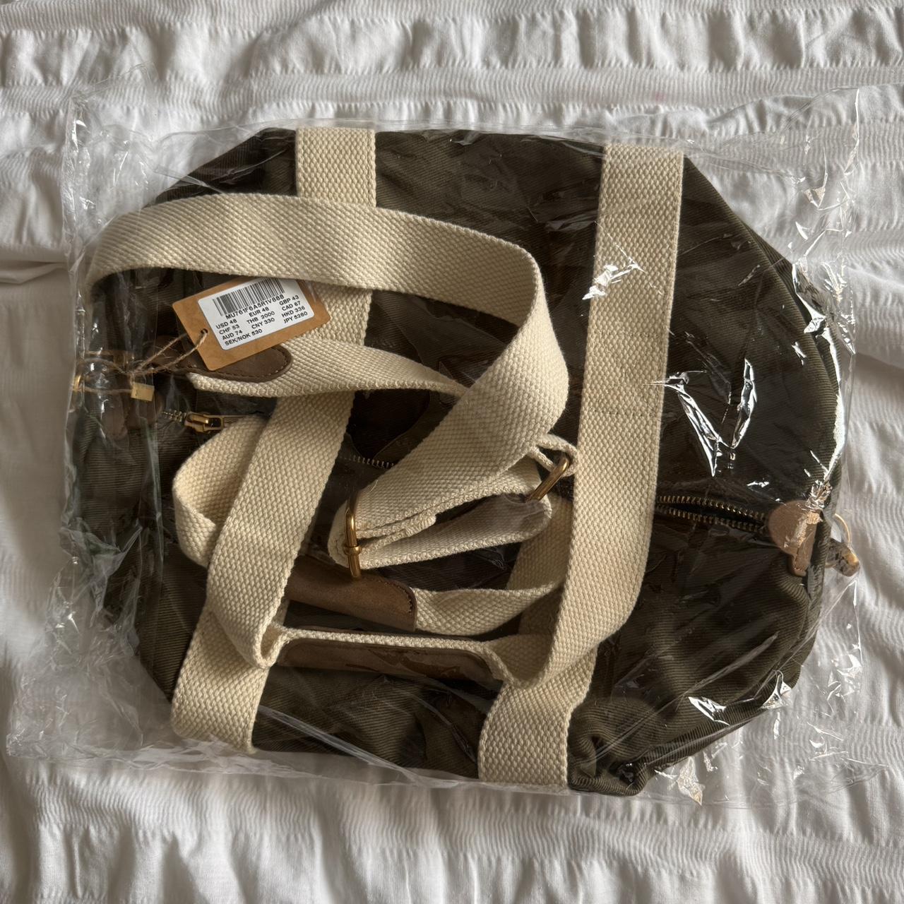 brandy melville mini duffle army green rrp... Depop