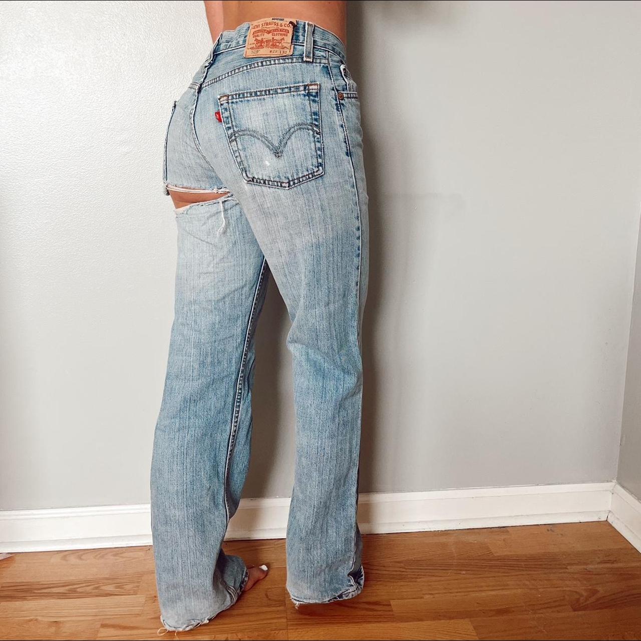 Levi's jeans with rip best sale under bum