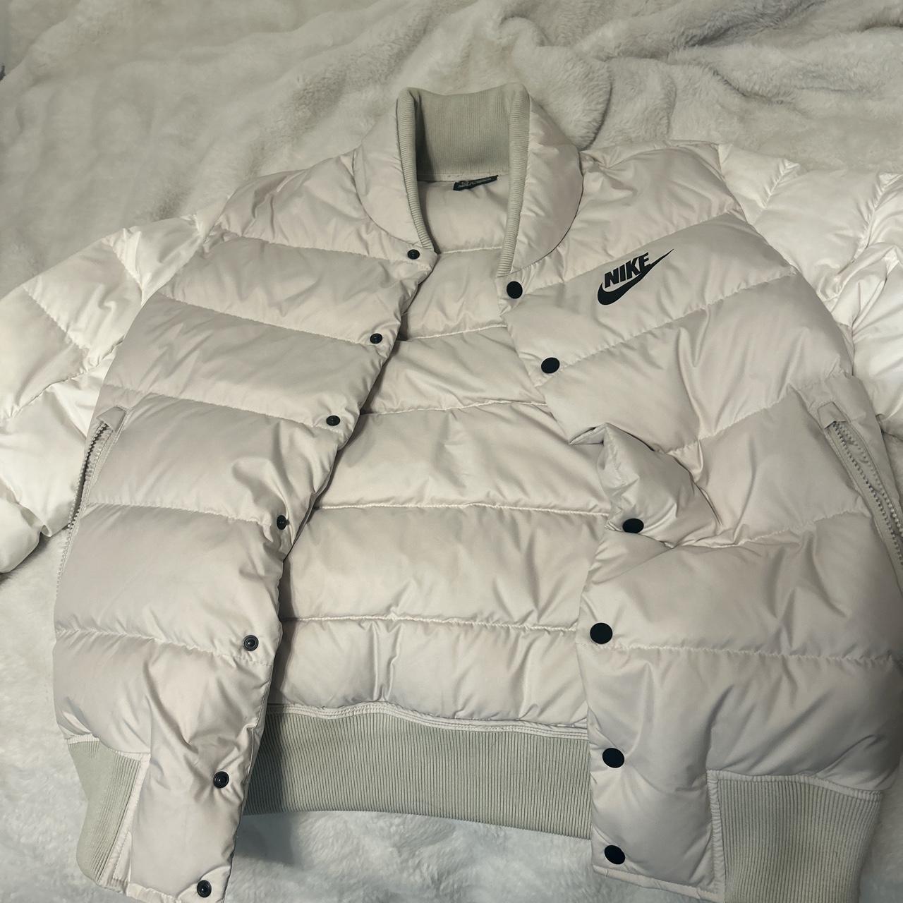 size small white Nike puffer fits bigger - Depop