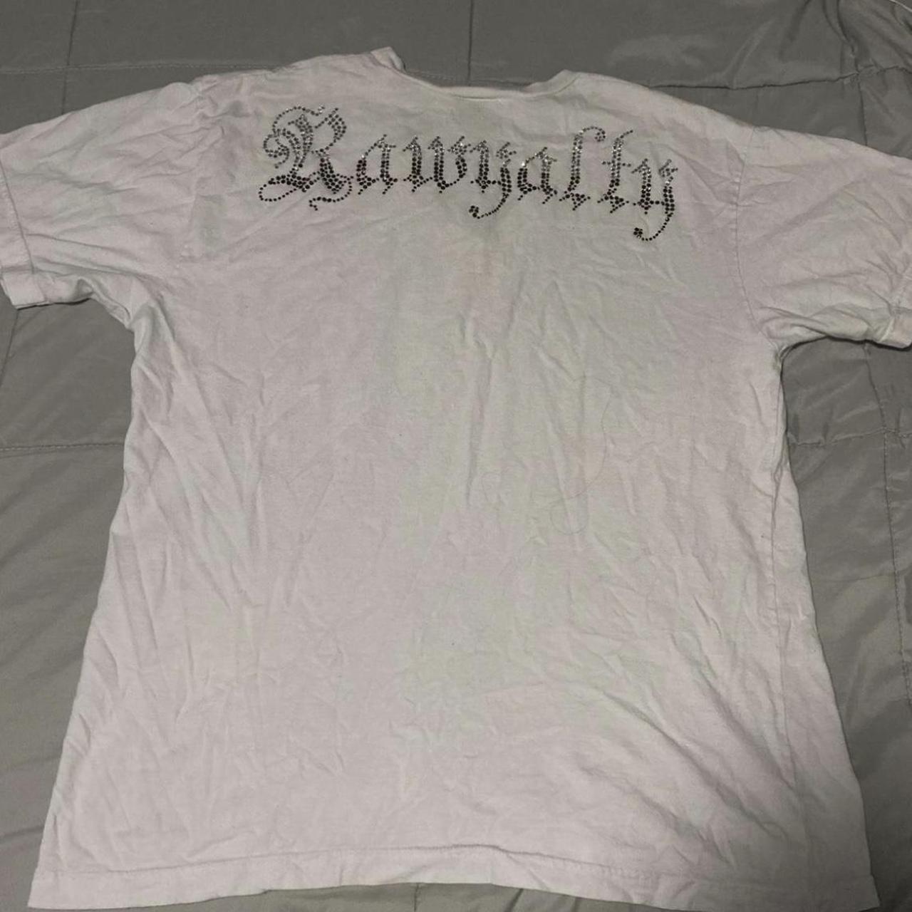 cross white tee shirt with design on the front and... - Depop