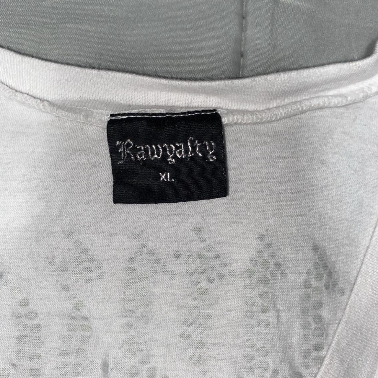 cross white tee shirt with design on the front and... - Depop