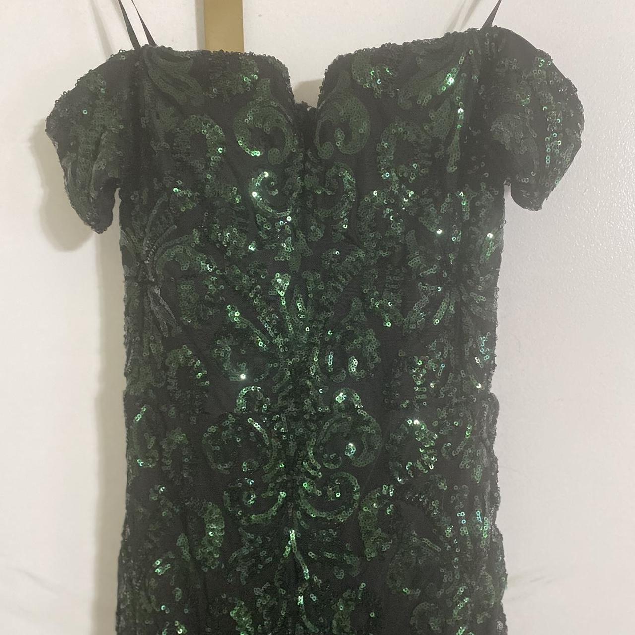 Green and black sequin dress with a