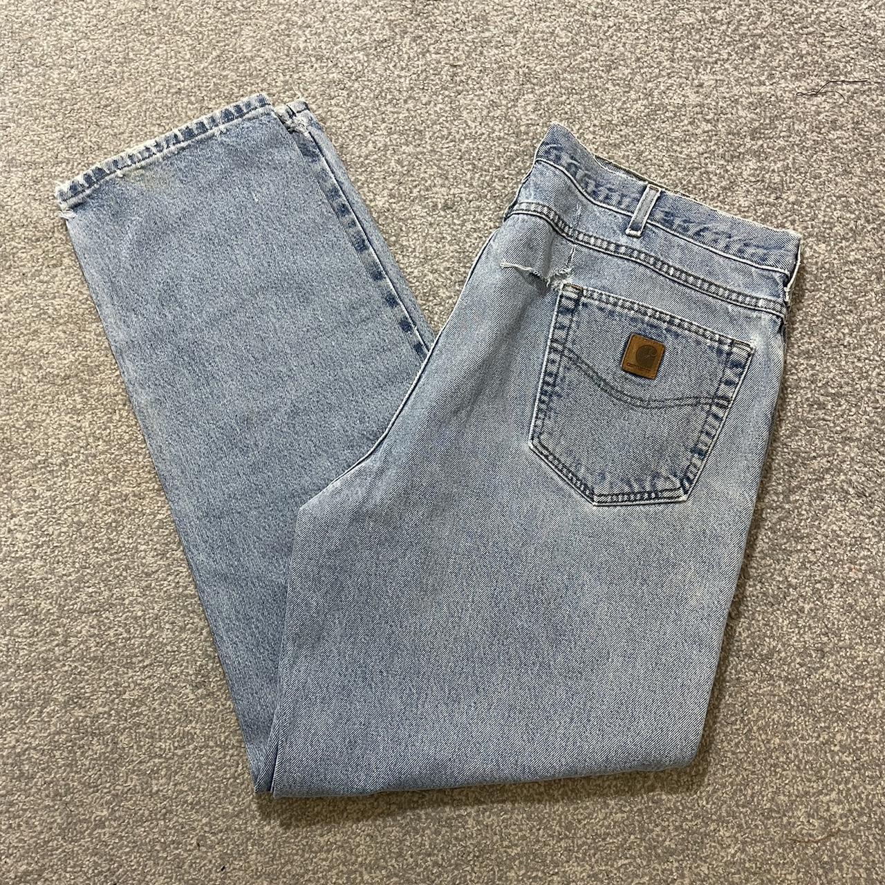 Carhartt blue denim jeans 40W 34L Rip above the... - Depop