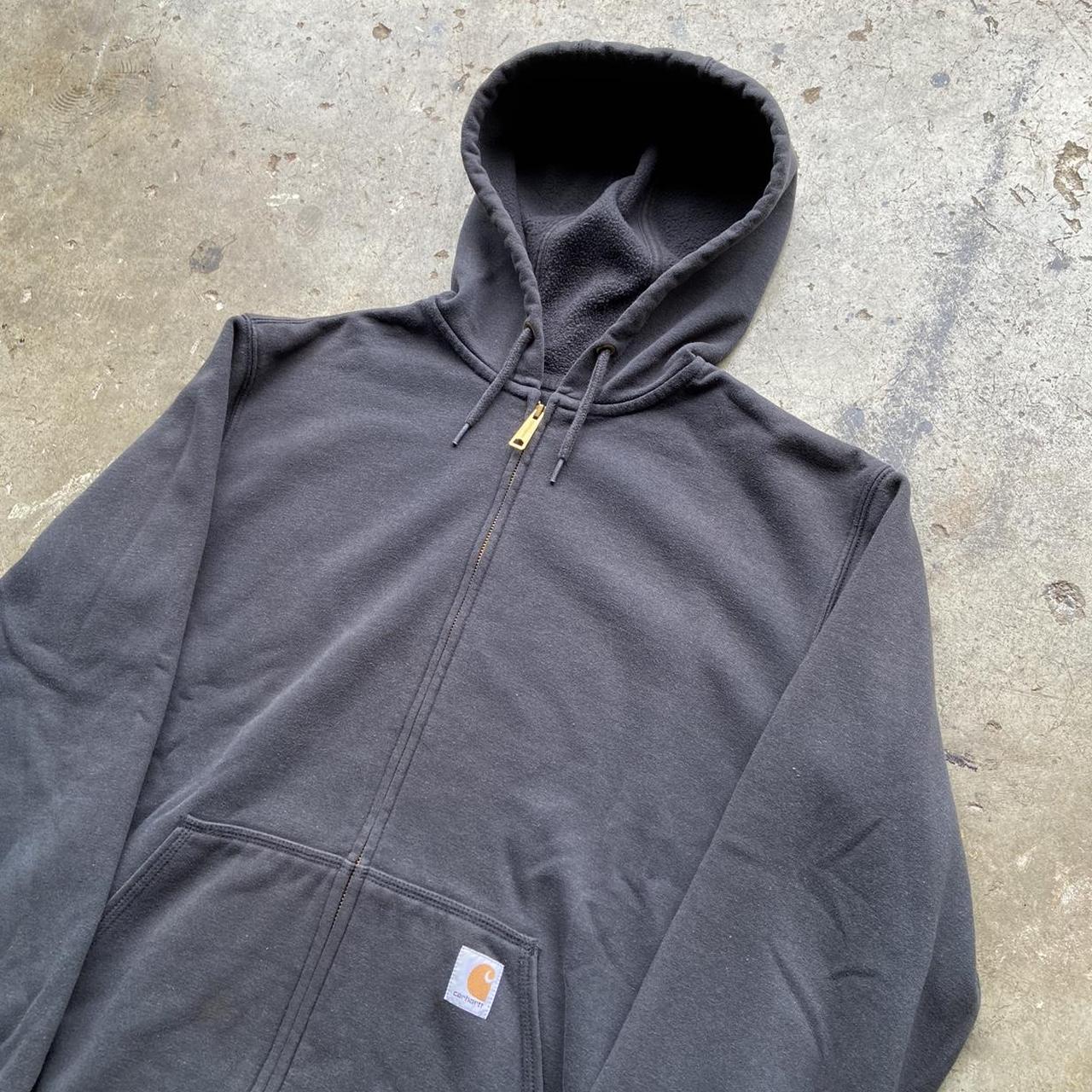 Essential faded black Carhartt hoodie! Size Large... - Depop