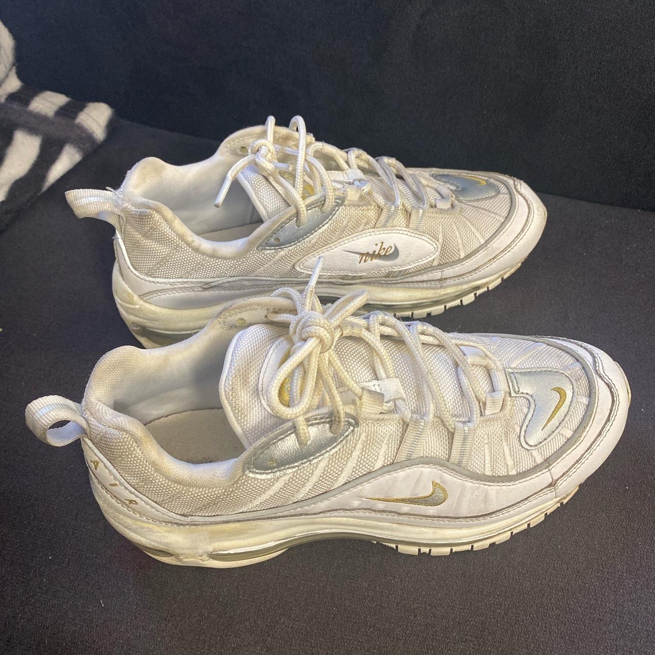 coolest pair of all white nike 98s with silver and