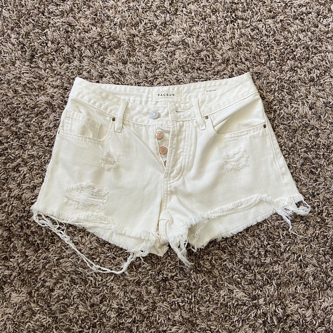 Pacson white ripped Jean Shorts. They button up in... Depop