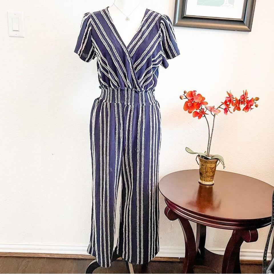 Canovas store striped jumpsuit