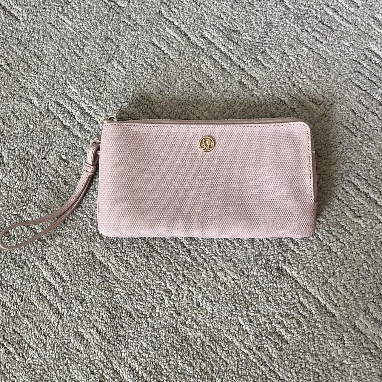 LULULEMON super cute light pink wallet. I love loved... Depop