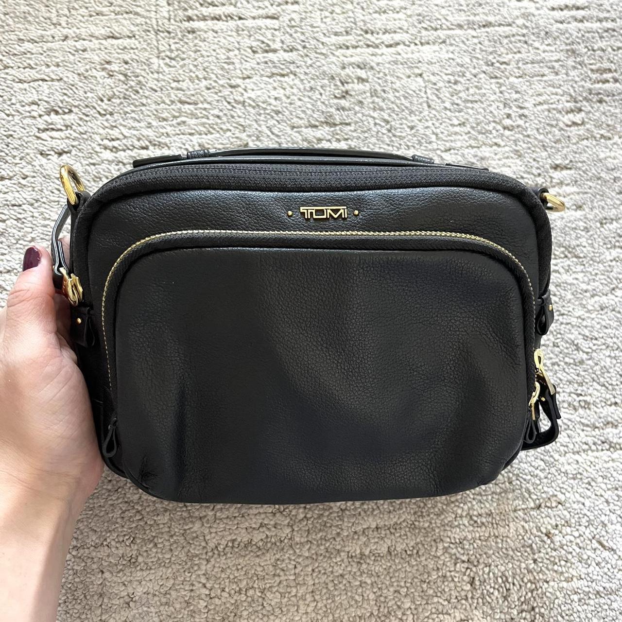 TUMI crossbody purse The hardware and interior are. Depop