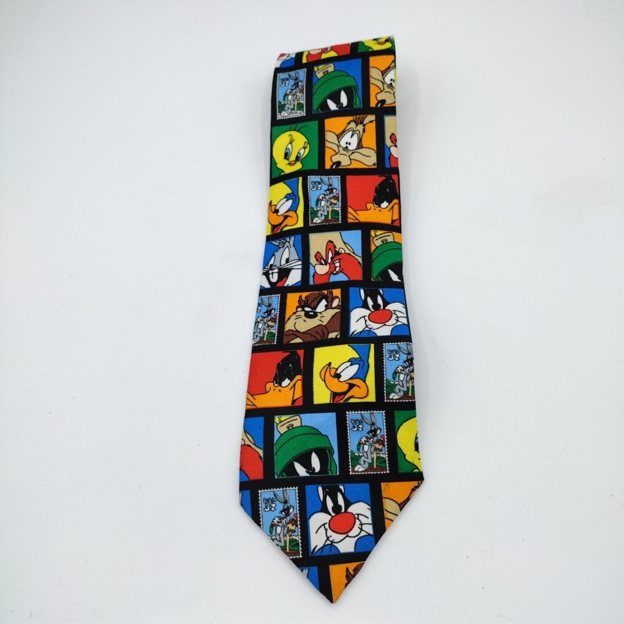 This Looney Tunes Stamp Collection tie features some... - Depop