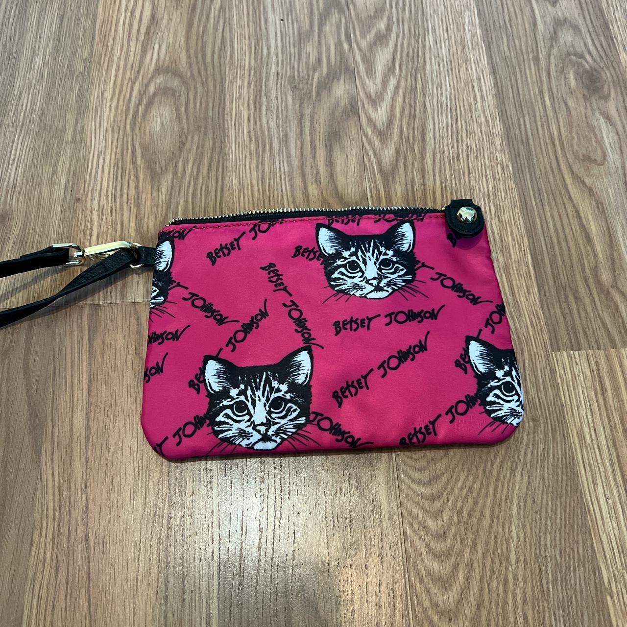 Betsy Johnson wristlet makeup bag. Measures 5.75 x