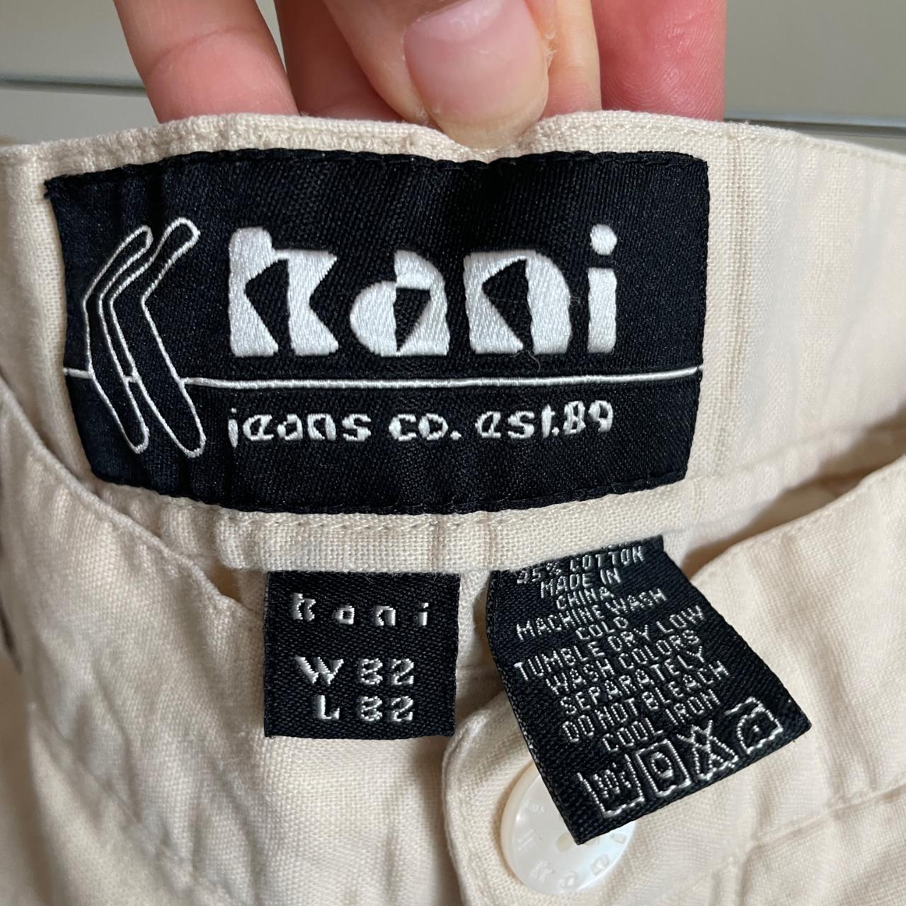 Karl Kani Men's Cream Trousers | Depop