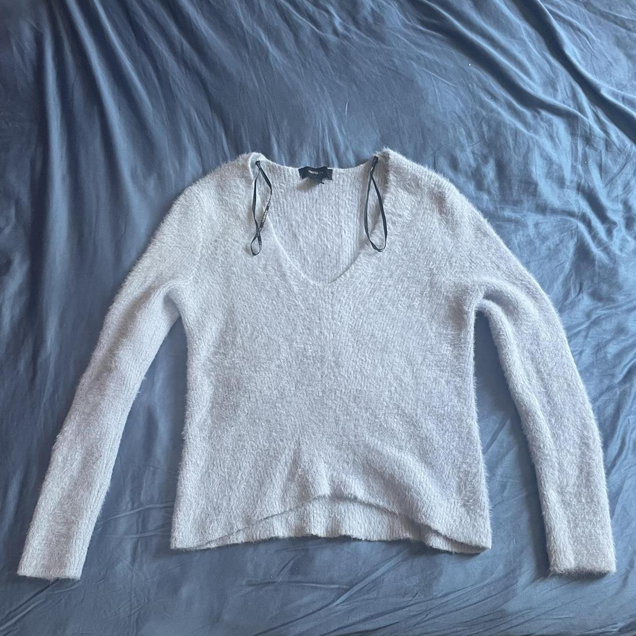 light blue fuzzy sweater, worn twice. very... - Depop