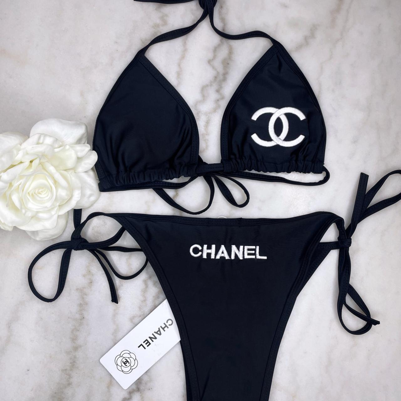Black designer bikini two piece with logo on front... Depop