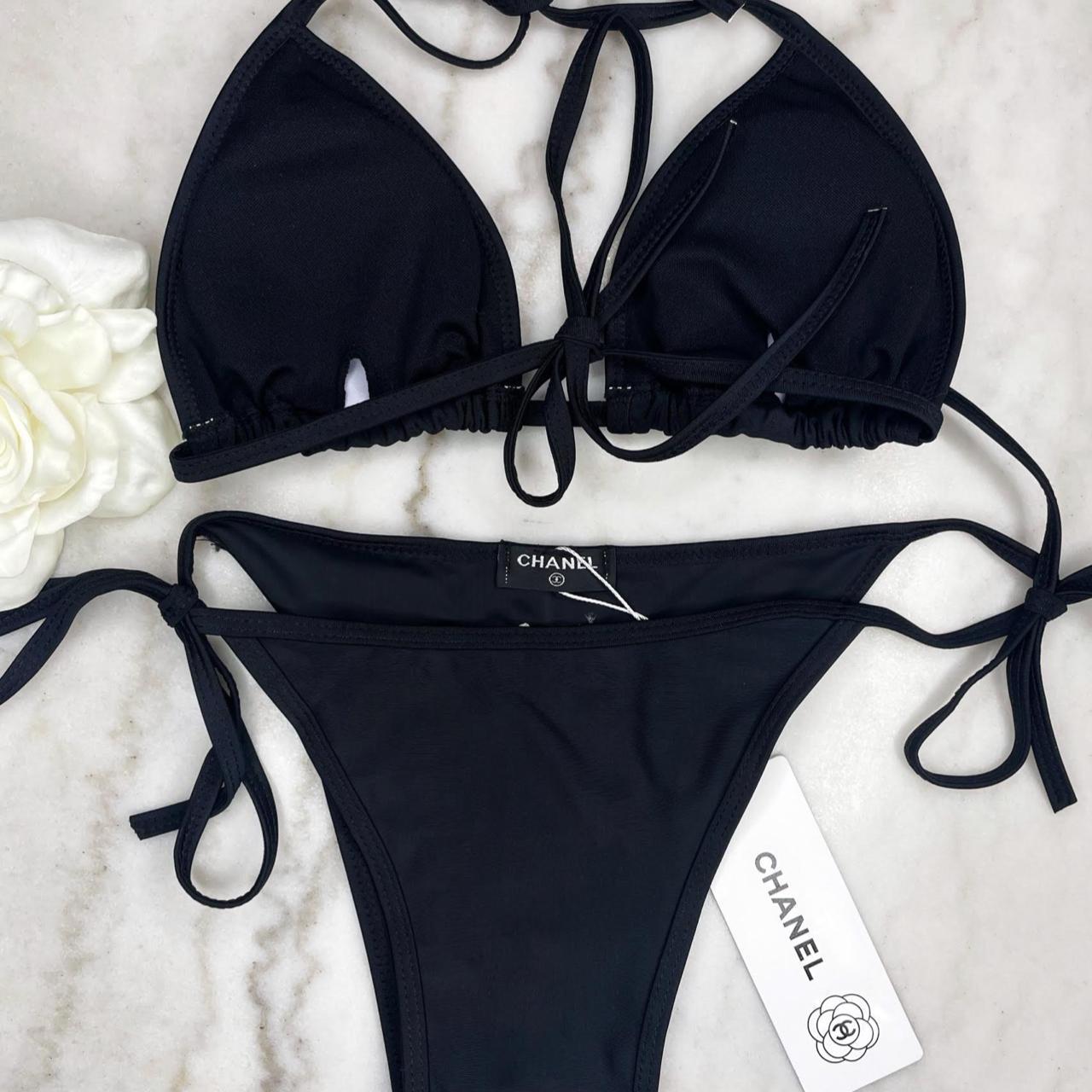 Black designer bikini two piece with logo on front... Depop
