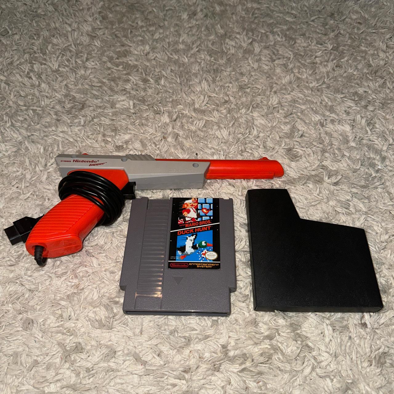 Nintendo Mario brothers, duck hunt, outlet and the Nintendo Gun