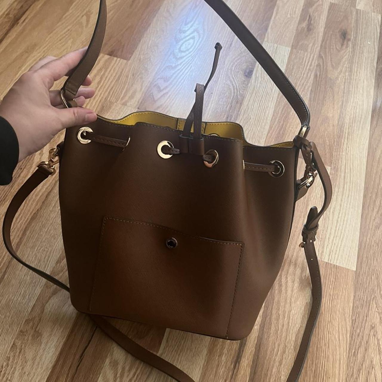 Tan Michael Kors medium bucket bag. Drawstring