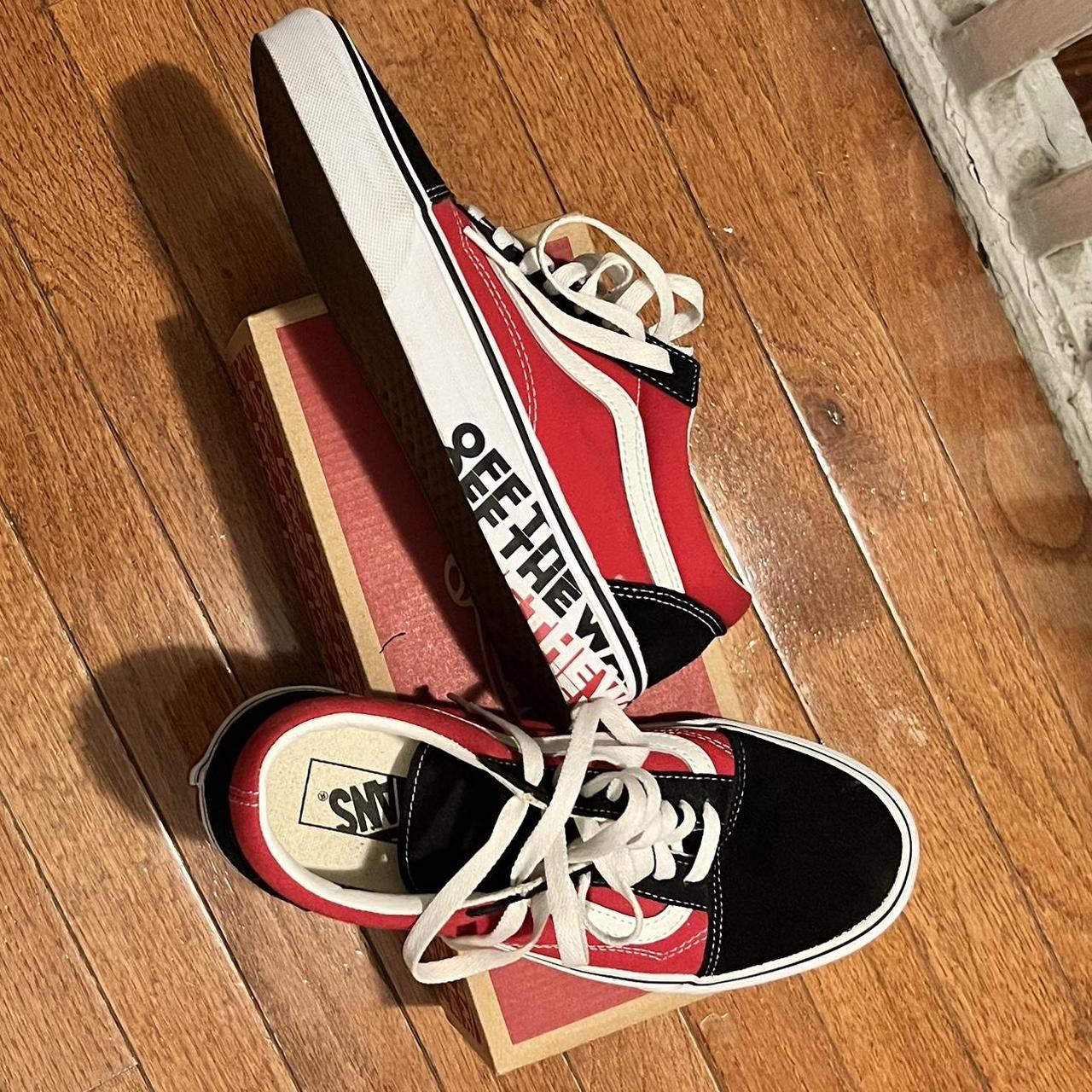 Black and red shop off the wall vans