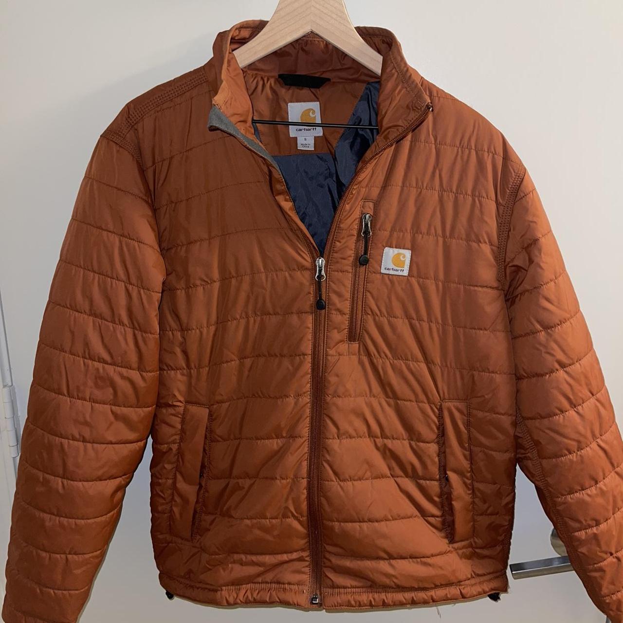 Burnt orange carhartt puff marshmallow jacket Only... Depop