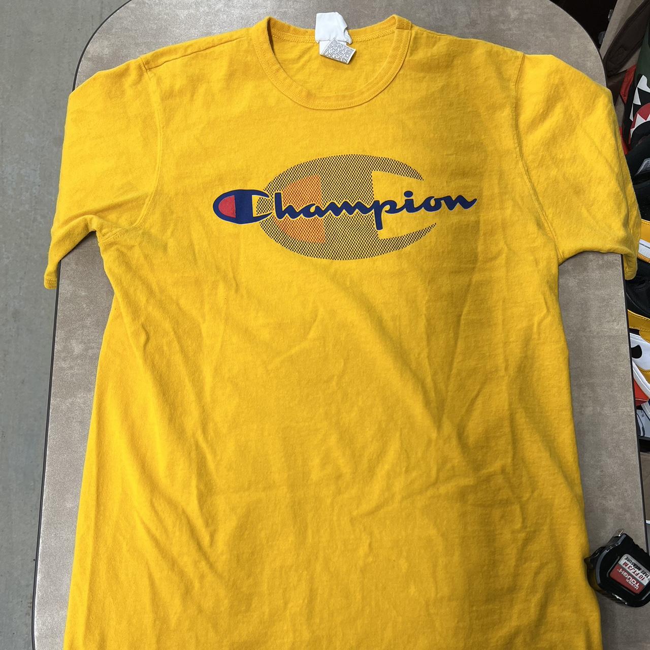 mustard yellow champion shirt