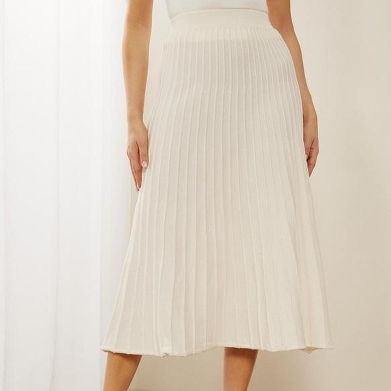 The Iconic (Atmos & Here) cream knit midi skirt... - Depop