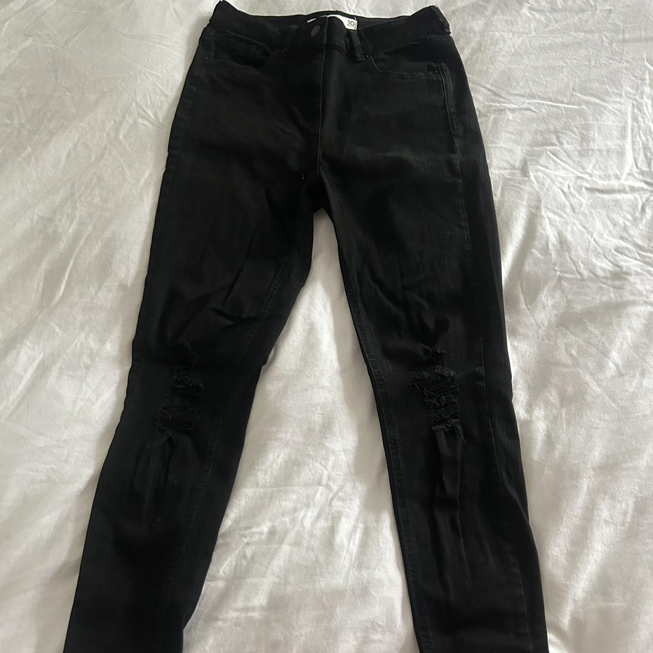 Jet black mid rise denim jeans with knee rips Skinny... - Depop