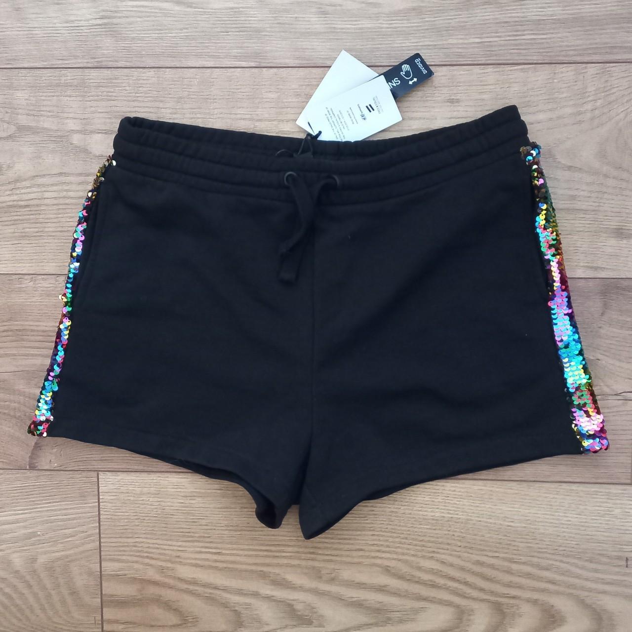 Black shorts with rainbow sequins down outer sides. Depop